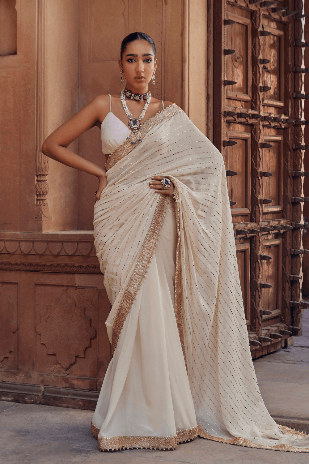 Ivory colour wedding shop saree